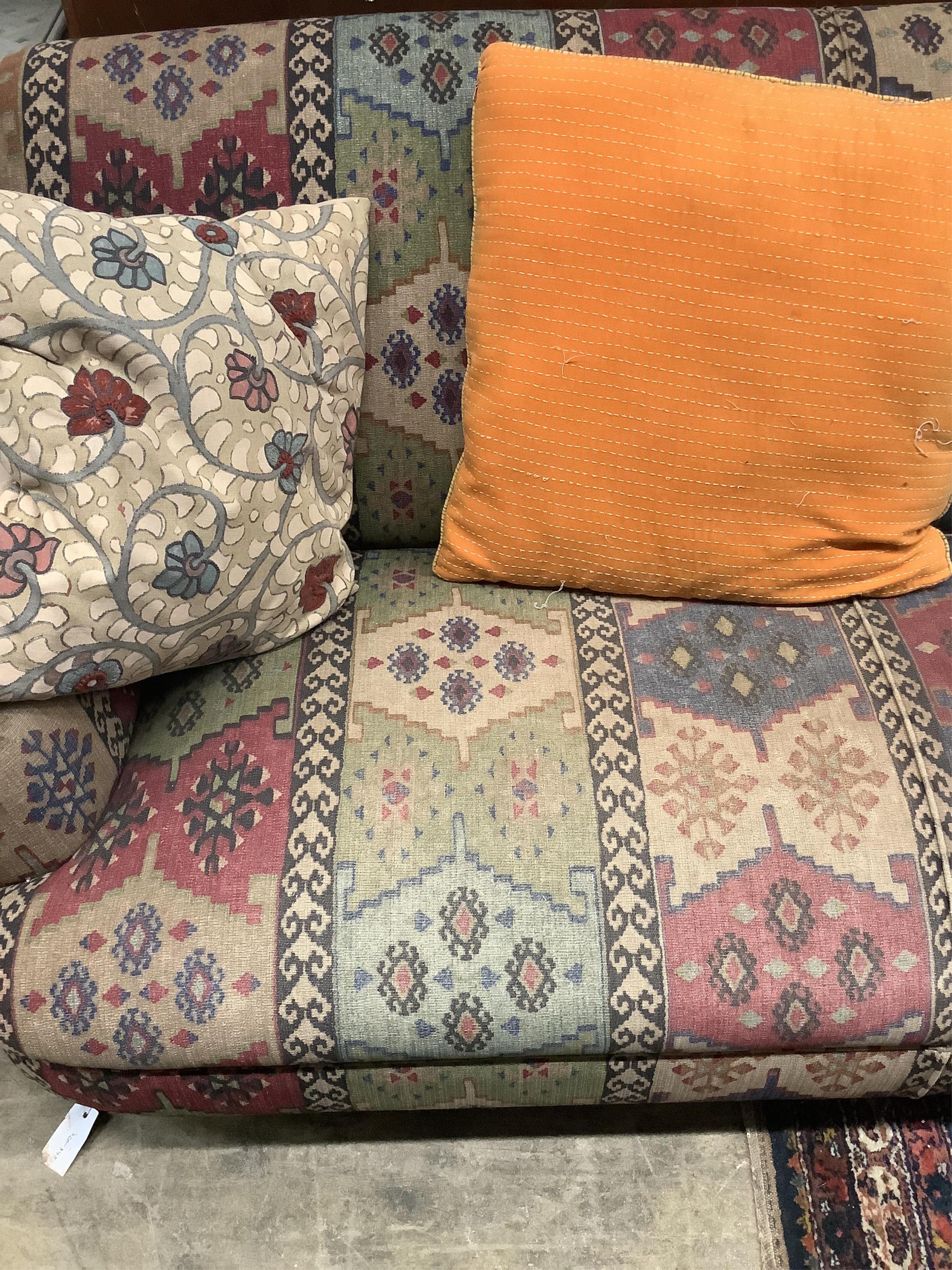 A two seater settee with Kilim style upholstery, width 178cm, depth 90cm, height 78cm. Condition - fair